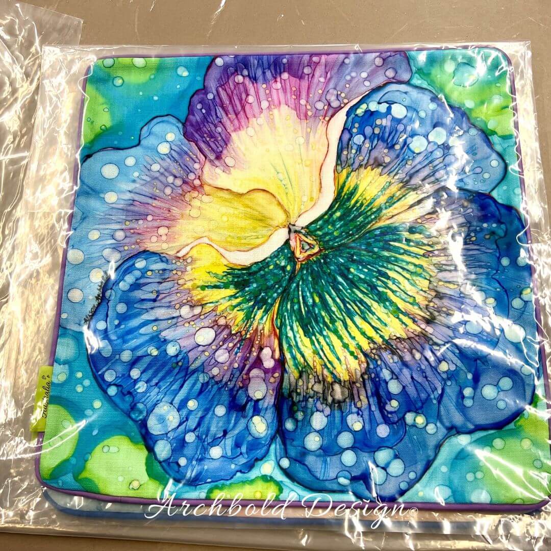 Blue pansy in the rain Cushion